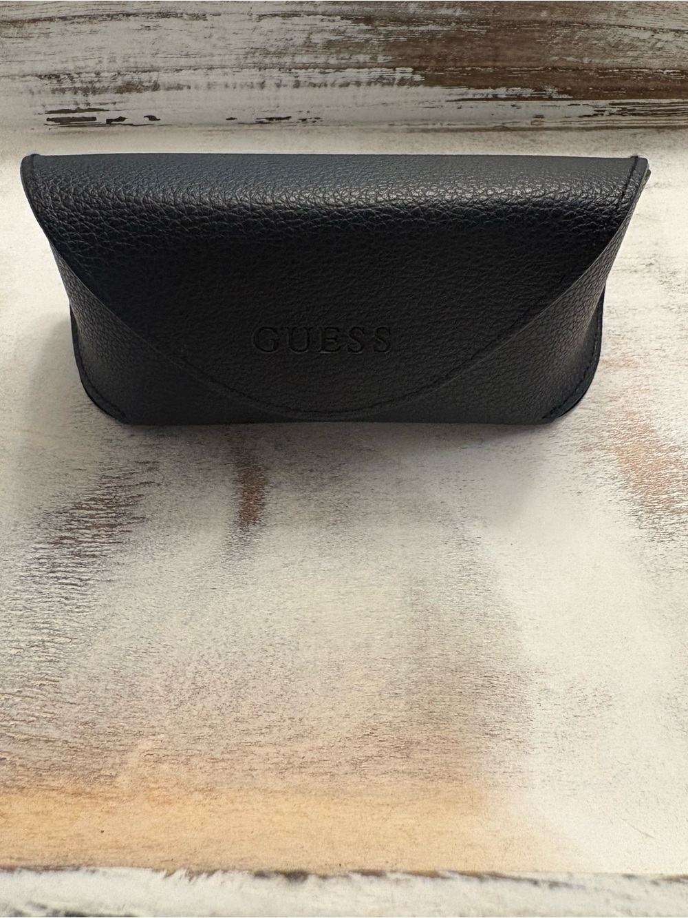 Black pebbled Guess oversized sunglasses case